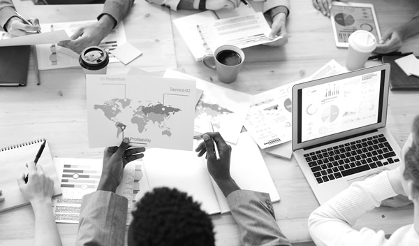 Business team working around a conference table